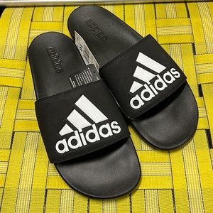Adidas size 10 black slides never been worn
